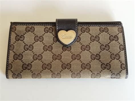 portafoglio gucci 460|Portafogli Gucci da donna .